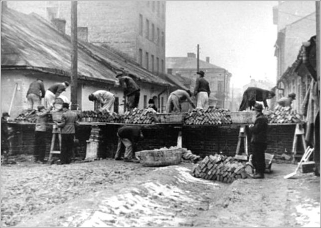 Jews at forced labor constructing the wall around the Krakow ghetto